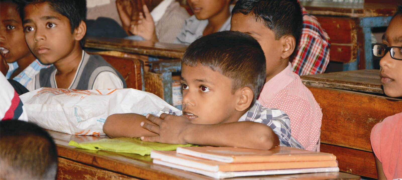 A student listening intently during a Global Classroom session.